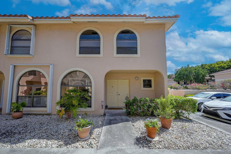 Located in sought after Coral Ridge Isles, quiet area of Northeast Ft Lauderdale. This spacious townhome is located close to the beaches, I-95, transportation, restaurants, and nightlife. Updated eat-in kitchen, with quartz countertop, knock-down ceilings with recessed lights, and all appliances. Remodeled guest bathroom houses with new washer and dryer included. Home has large rooms and an open combo living-dining area with a large arched window that provides lots of natural light. The master bedroom is large and spacious with a considerable sized walk-in-closet and master bathroom. Upgraded flooring throughout, including wood laminate in the bedrooms upstairs, tile in bathrooms and LPV flooring downstairs. This home features a second and third bedroom, both are perfect for a den or an office. This lovely townhome includes many extras! Screened in patio, upgraded lighting, ceiling fans, upgraded electrical panel and steps away from the community pool. AC 2013, water heater 2017, roof 2019. This beautiful corner townhouse is a rare find and Priced to Sell!