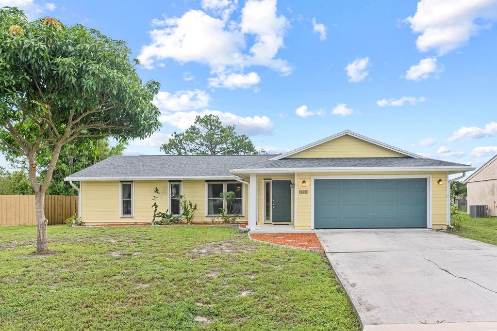Photo of 2251 SE Sidonia Street, Port Saint Lucie, FL 34952 (MLS # R11110346)