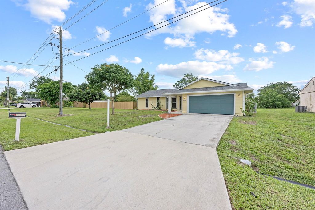 Photo of 2251 SE Sidonia Street, Port Saint Lucie, FL 34952 (MLS # R11110346)