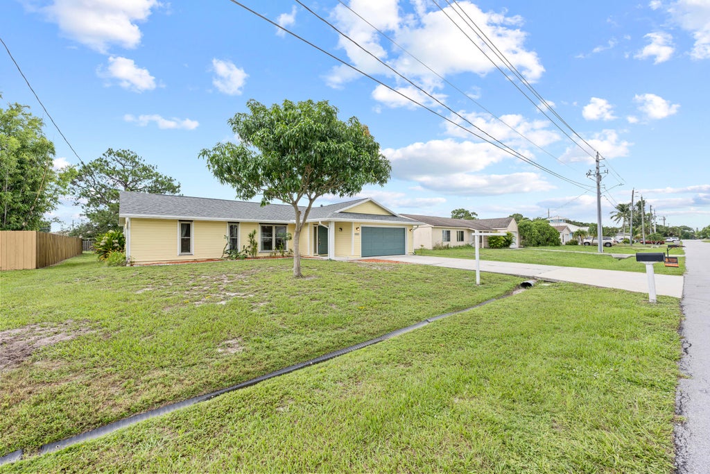 Photo of 2251 SE Sidonia Street, Port Saint Lucie, FL 34952 (MLS # R11110346)
