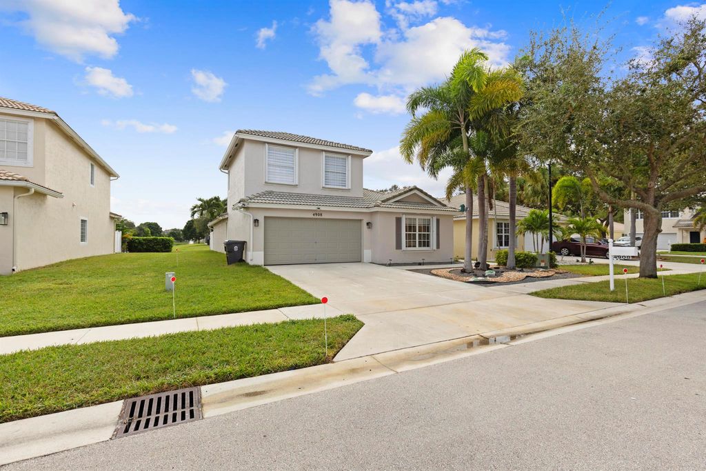 Photo of 4908 Lombard Pass Drive, Lake Worth, FL 33463 (MLS # R11135194)
