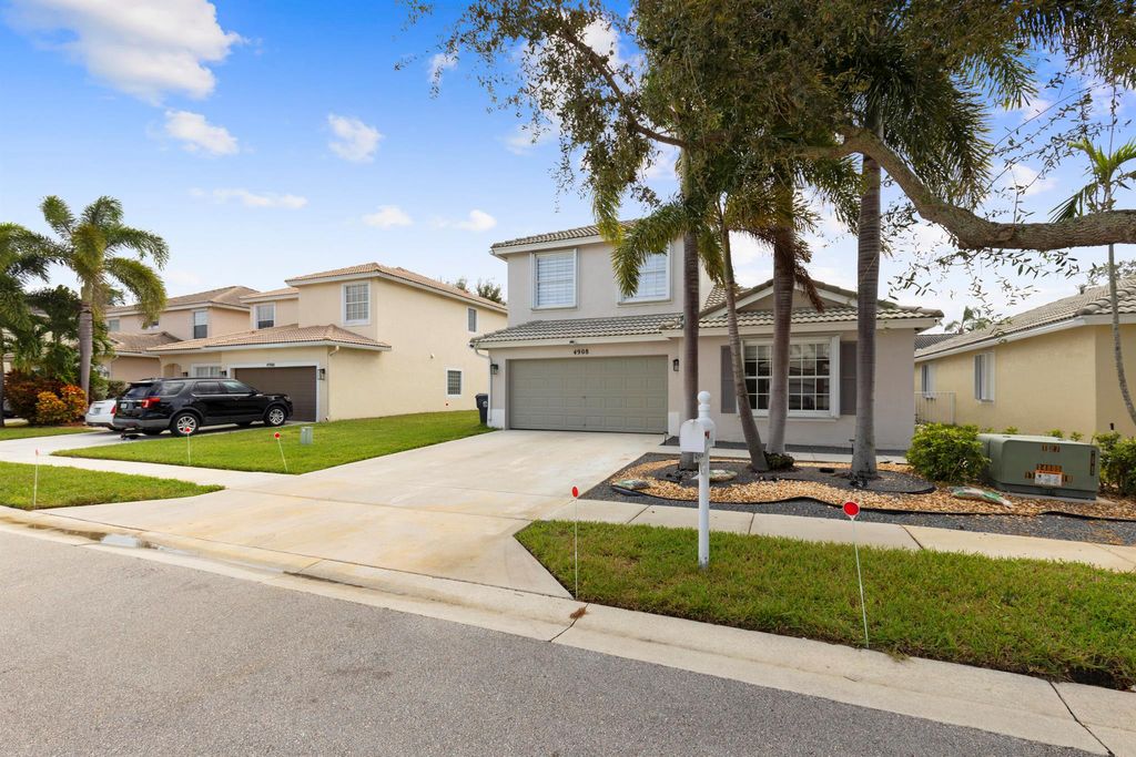 Photo of 4908 Lombard Pass Drive, Lake Worth, FL 33463 (MLS # R11135194)