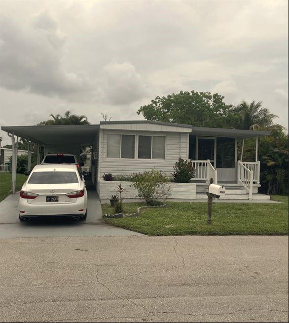 Absolutely gorgeous 2/2 split bedroom plan with screened in patio - carport - shed - -nice size lot in Sec. 3 - -totally updated kitchen counters and cabinets - updated bathroom - -beautiful laminate floors - priced right for quick sale - -truly a must see - -Assoc. states it is HOPA verified...