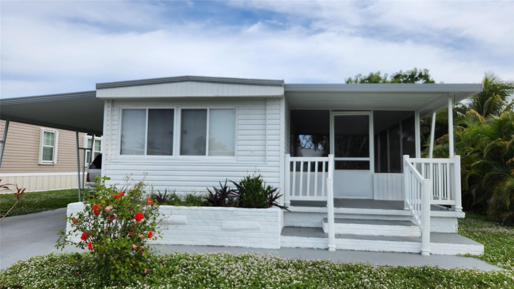 Absolutely gorgeous 2/2 split bedroom plan with screened in patio - carport - shed - -nice size lot in Sec. 3 - -totally updated kitchen counters and cabinets - updated bathroom - -beautiful laminate floors - priced right for quick sale - -truly a must see - -Assoc. states it is HOPA verified...*******Owner Financing Available********