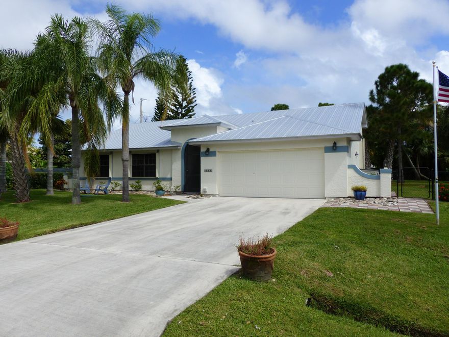 WELL MAINTAINED 3/2/2 ON 1/3 OF AN ACRE LOT, NEWER METAL ROOF, ACCORDIAN SHUTTERS, TILE & WOOD FLOORING, VAULTED CEILINGS, OFFICE WITH NICE BUILT IN BOOKCASE & LAMINATE FLOORING, LARGE MASTER ENSUITE, WALK IN CLOSETS, KITCHEN NOOK WITH BAY WINDOW, BEAUTIFUL HUGE LANDSCAPED YARD WITH ABILITY TO PARK YOUR BOAT OR RV NEXT TO THE HOUSE. TAKE A VIRTUAL TOUR OF THIS EXCELLENT PROPERTY AND SEE FOR YOURSELF THAT BEING CLOSE TO THE BEACHES, RESTAURANTS AND SHOPPING CENTRES IS STILL POSSIBLE AT A REASONABLE PRICE.