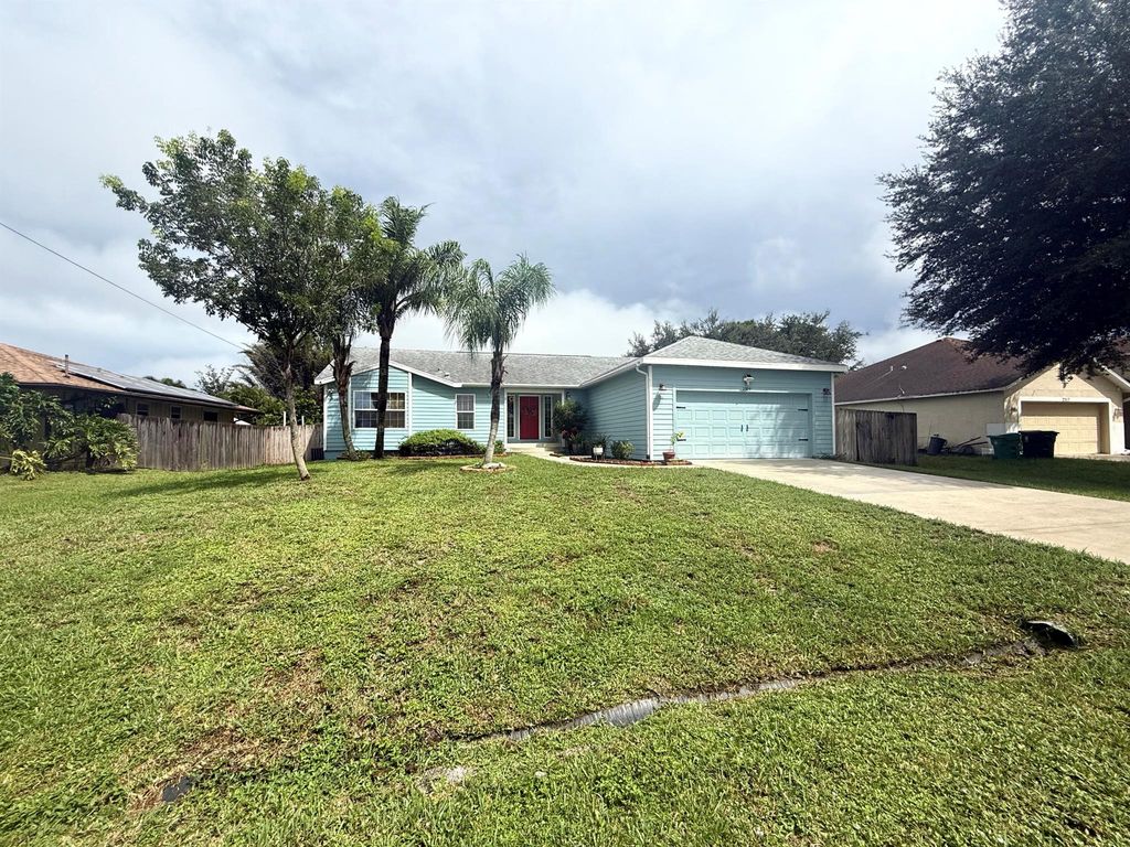 Photo of 2509 SW Cooper Lane, Port Saint Lucie, FL 34984 (MLS # R11127684)