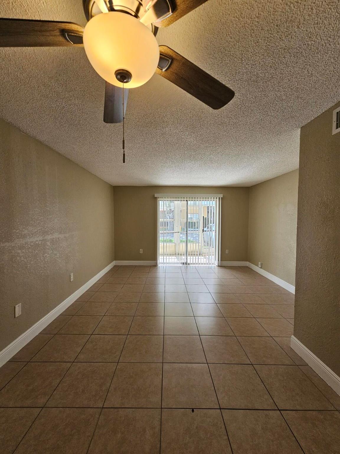 Discover the perfect blend of comfort and convenience in this spacious 1,239 sq ft 2-bedroom, 2-bathroom corner unit located on the 1st floor in the heart of Deerfield Beach. This well-maintained home features tile flooring throughout, a beautifully updated kitchen with granite countertops and stainless steel appliances, fully renovated bathrooms, and decorative ceiling fans. Freshly Painted. Enjoy the comfort of a New A/C during the hot Florida summers. Conveniently situated just minutes from I-95 and major roadways, this property offers easy access to shopping, dining, and everything the area has to offer. Don't miss out on this exceptional rental opportunity!