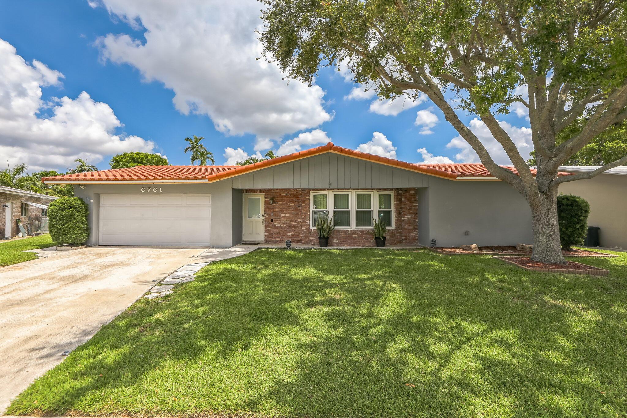 Must see this 4 Bedroom, 2 Bath Single Family Pool Home Located in Margate Shores! Not in a Flood zone! Features Include: Spacious Layout With A Huge Enclosed Florida Room. Remodeled Granite Countertops in Kitchen with new Wood Cabinets (2023). Nice Laminate and Tile Floors Throughout. Split Bedroom Floor Plan. Large Lot With Nice Side Yard. This Is A Sullivan-Built Home W/ Concrete Roof and Walls. New Diamondbrite & Painted Pool Deck in 2024. Attached 2 Car Garage that's been renovated with wood cabinets and ceiling racks for storage. RainSoft Water Softening System. Hurricane windows. Roof less than year old! Close to shopping, schools, I95, Police/Fire, City Hall and 19 Impressive City Parks! No HOA Fees!