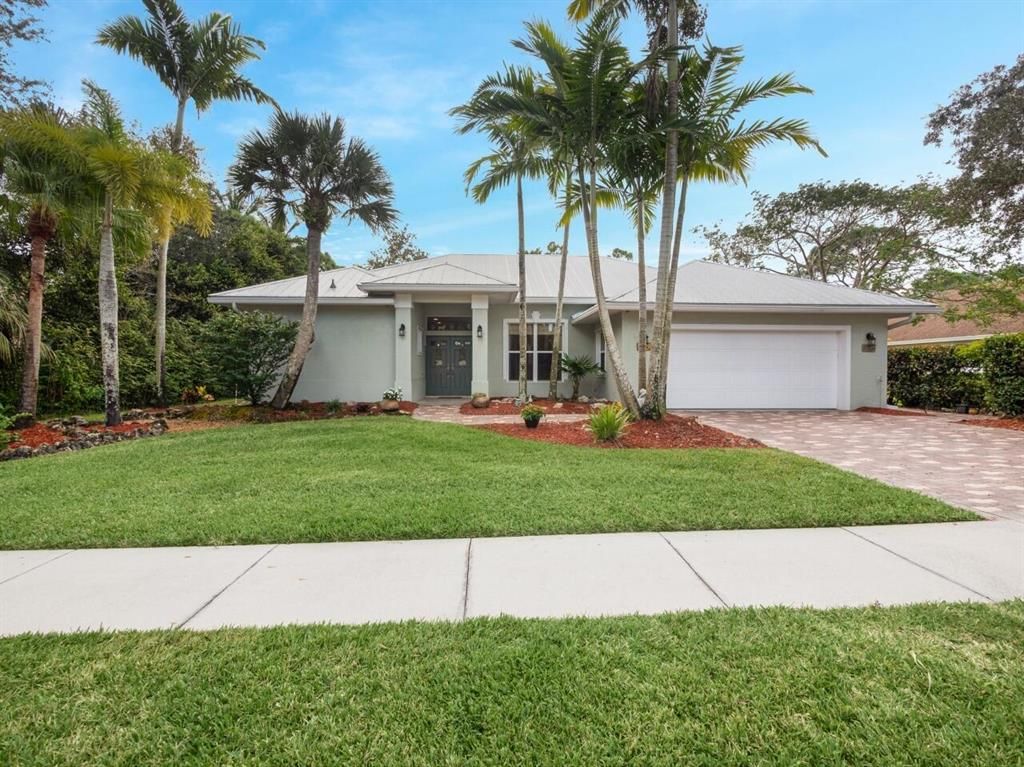 Photo of 8177 SW Yachtsmans Drive, Stuart, FL 34997 (MLS # R10759894)