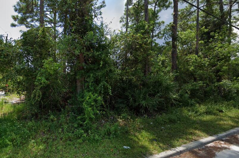 Great opportunity to build your dream home on a beautiful corner lot in quaint neighborhood of Vero Beach!