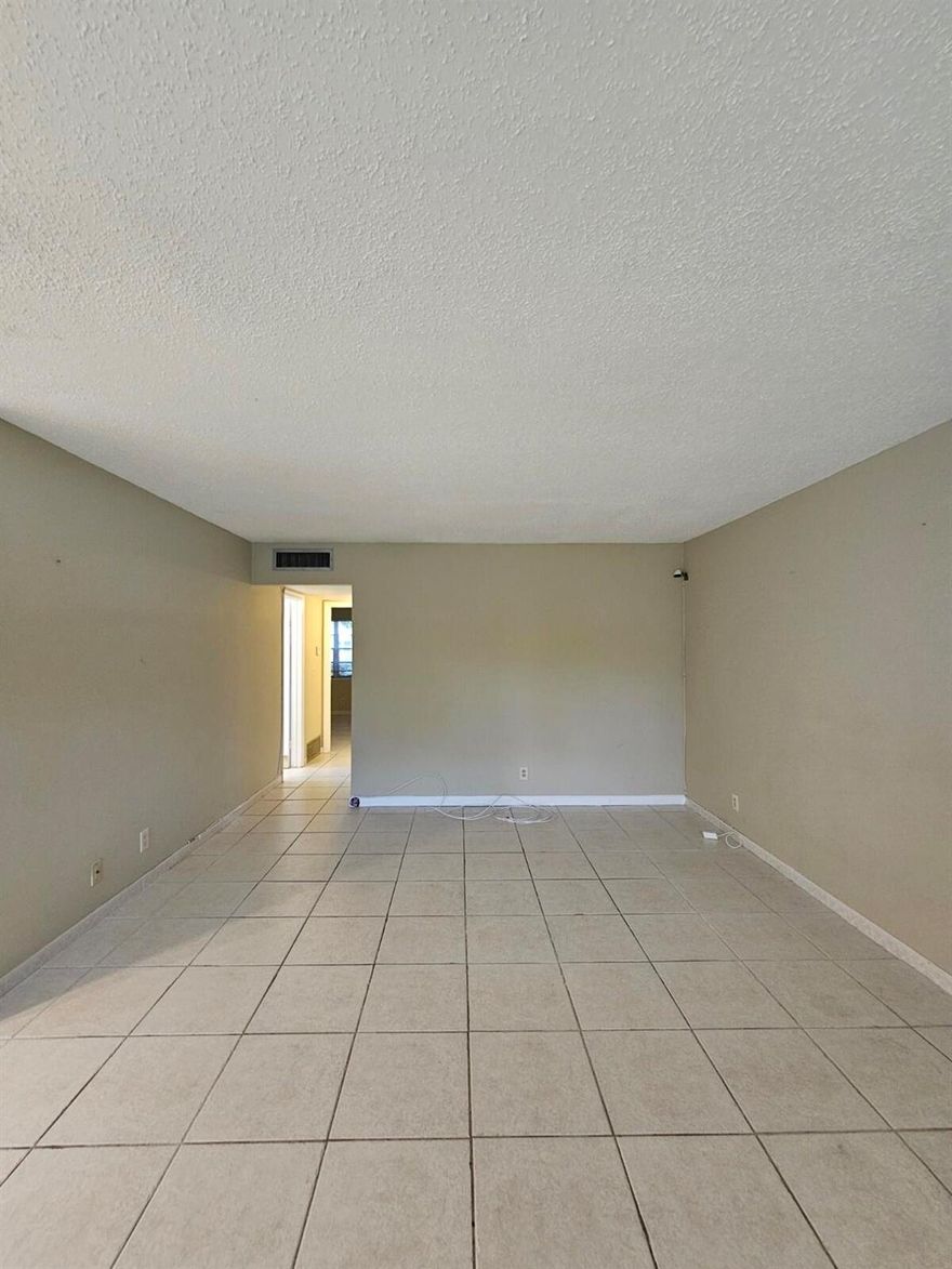 Beautiful 1st floor corner unit in a 55+ community! Features 2 bedrooms, 1.5 baths, central A/C, tile floors, a large walk-in closet, and upgraded baths. Enjoy a peaceful garden view in a move-in ready home. Community amenities include pools, theater, library, classes, free bus service, pharmacy, and more!MOVE IN WITH JUST FIRST MONTH'S RENT AND ONE MONTH'S SECURITY DEPOSIT - NO LAST MONTH NEEDED! TOTAL TO MOVE IN: 2 MONTHS' RENT.