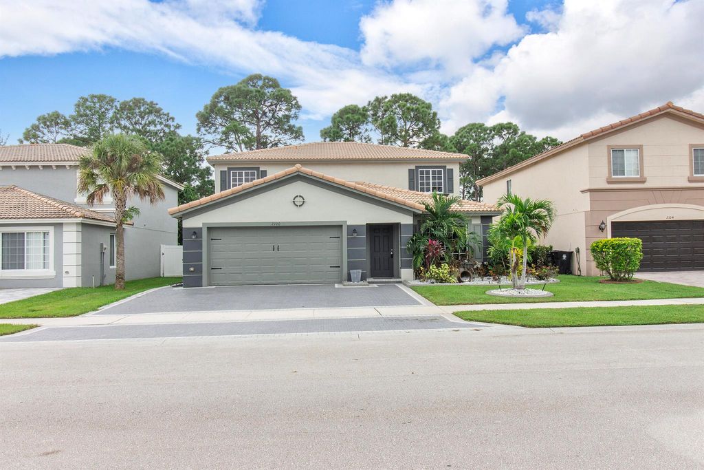 Photo of 2100 SW Marblehead Way, Port Saint Lucie, FL 34953 (MLS # R10928074)