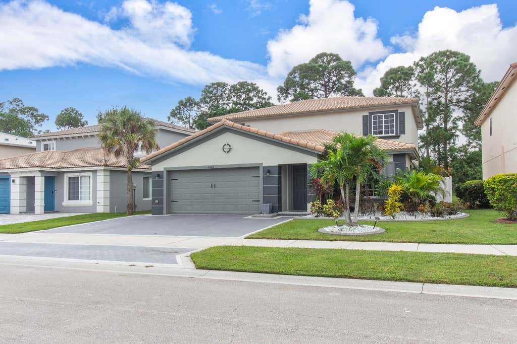 Photo of 2100 SW Marblehead Way, Port Saint Lucie, FL 34953 (MLS # R10928074)