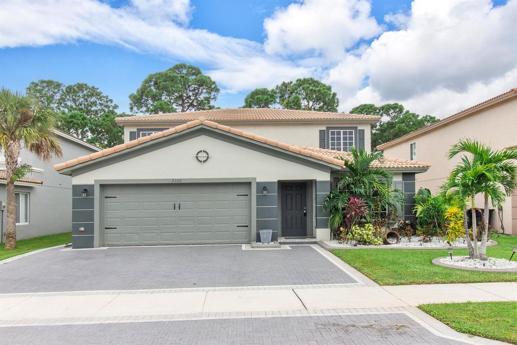 Photo of 2100 SW Marblehead Way, Port Saint Lucie, FL 34953 (MLS # R10928074)