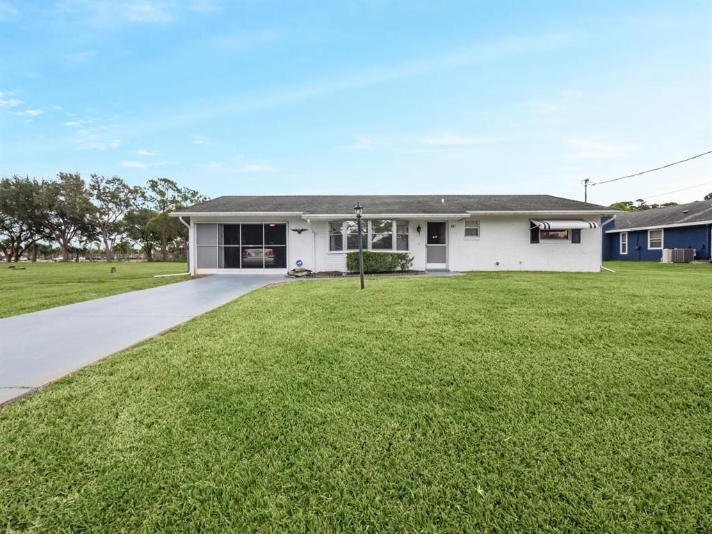 Photo of 481 SW Curtis Street, Port Saint Lucie, FL 34983 (MLS # R10771650)