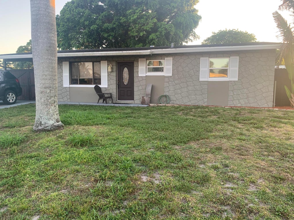 Photo of 12233 Hillman Drive, Palm Beach Gardens, FL 33410 (MLS # R10972583)