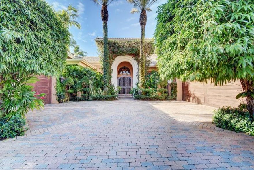 Enchanting 4 BR / 4 BA / 1 HB + office estate with incredible attention to detail and spectacular, private oasis.


The living room has wondrously high ceilings; a separate dining room with built-in wine storage; a full bar with refrigerator; and is awash in natural Florida sunlight from the expansive windows.


The kitchen is adorned with top of the line appliances, such as a gas stove and two ovens. It is open to the family room with built-ins, breakfast nook, and has excellent views of the backyard.


The backyard enjoys a heated pool and spa, brick pavers, a built-in grill, lush landscaping, and a large overhang perfect for entertaining.


The second bedroom is on the first floor and is privately placed in its own corridor. It has an ensuite bathroom as well as a large walk Upstairs, the third bedroom shares a Jack-and-Jill bath with the loft, which can easily be converted into an additional bedroom. The upstairs bathroom has its own sizeable walk-in closet, perfect for storing linens or seasonal pieces.


The master wing features an office with gorgeous wood built-ins and entry to the front garden. The master bedroom, itself is incredibly spacious, with entry to and a view of the backyard, two large walk-in closets with automatic lights. The white marble master bath enjoys his-and-her water closets, a substantial linen closet, and a jacuzzi tub, with a view of the private sitting area with fountain.