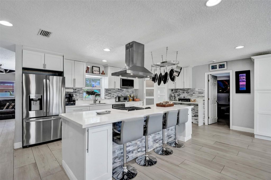 Photo of 3649 Jackson Boulevard, Fort Lauderdale, FL 33312 (MLS # F10514178)
