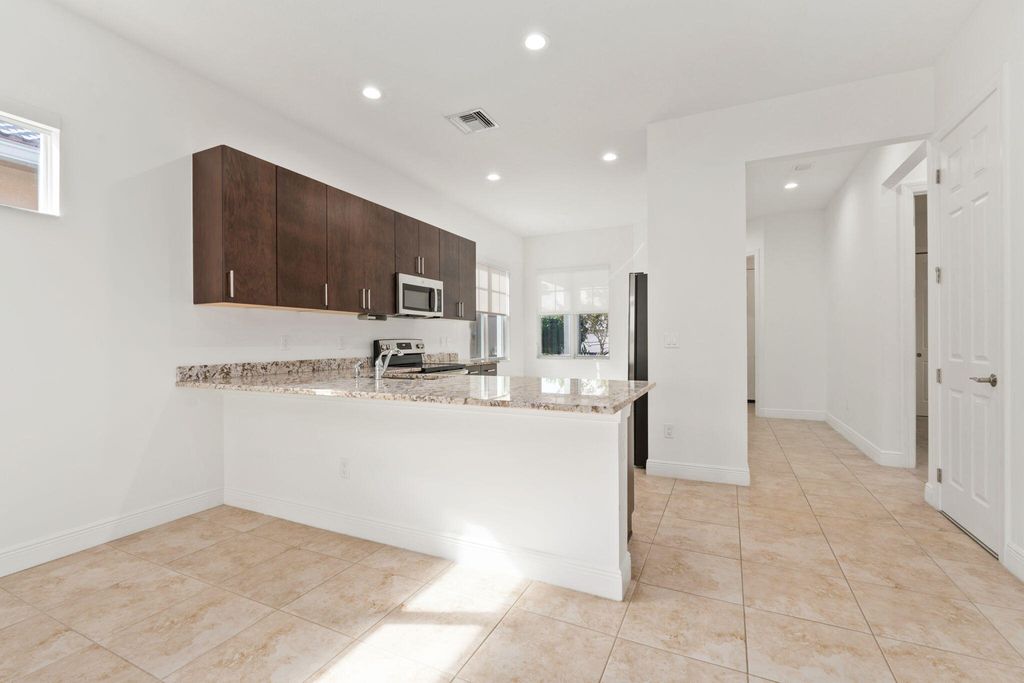 Photo of 9189 SW Pepoli Way, Port Saint Lucie, FL 34987 (MLS # R11153879)