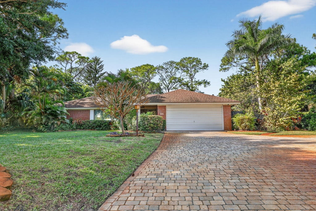 Photo of 1444 NW Spruce Ridge Drive, Stuart, FL 34994 (MLS # R11151153)