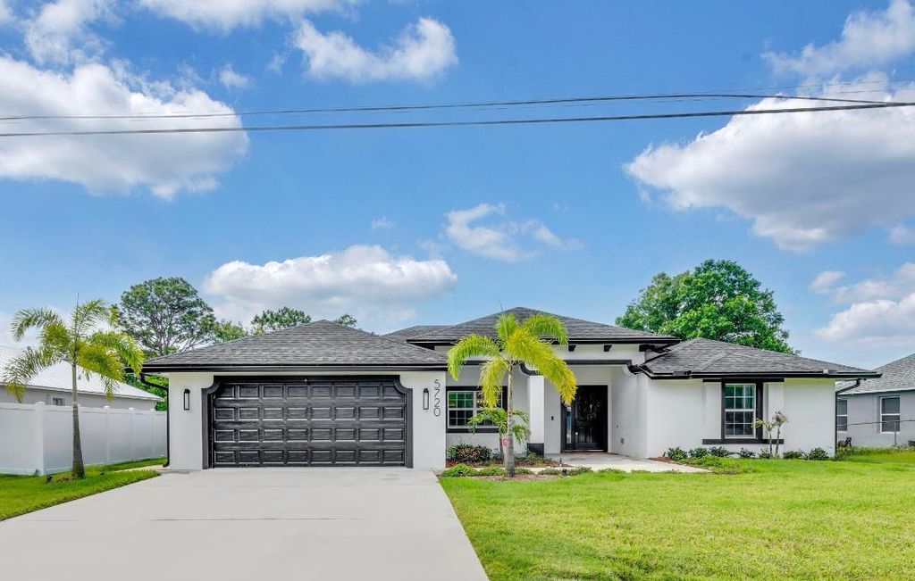 Photo of 5720 NW Alcazar Terrace, Port Saint Lucie, FL 34986 (MLS # R10986056)