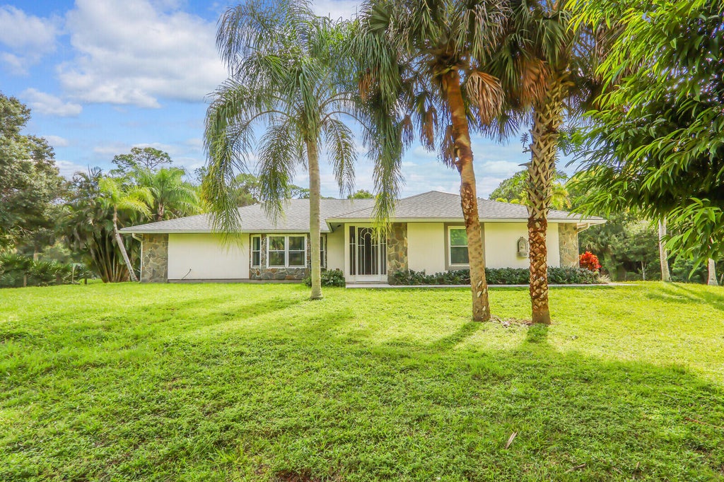 Photo of 10358 158th Street N, Jupiter, FL 33478 (MLS # R11131113)