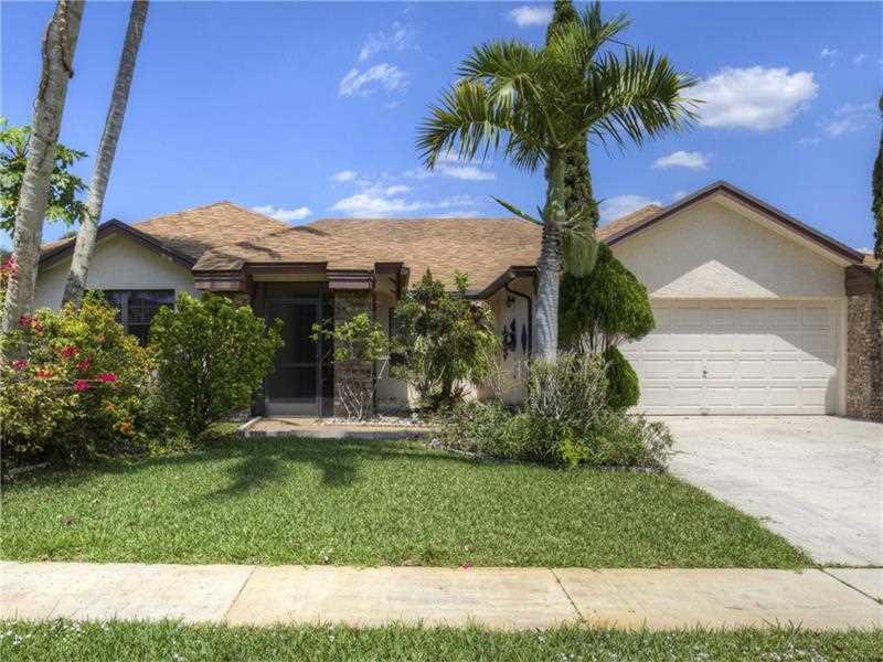 **Prepare to be wowed by this 4 bedroom, 2 bathroom rental home with an open floor plan in Boca Raton, FL! You will love the ample counter and cabinet space in the eat-in kitchen and the vaulted ceiling in the inviting family room. The master bedroom is complete with a walk-in closet as well as a master bath with walk-in shower. The patio in the perfect place to host a backyard barbecue or just enjoy your morning coffee!