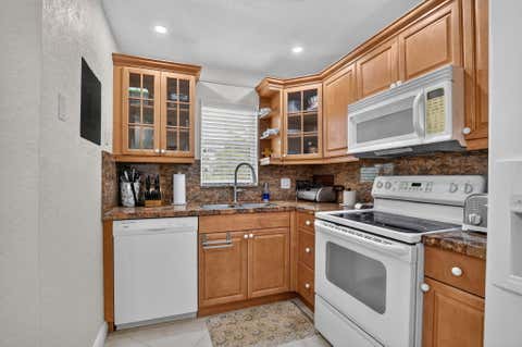 Tiny photo for 2460 DEER CREEK COUNTRY CLUB Boulevard #206-A, Deerfield Beach, FL 33442 (MLS # B26052596)