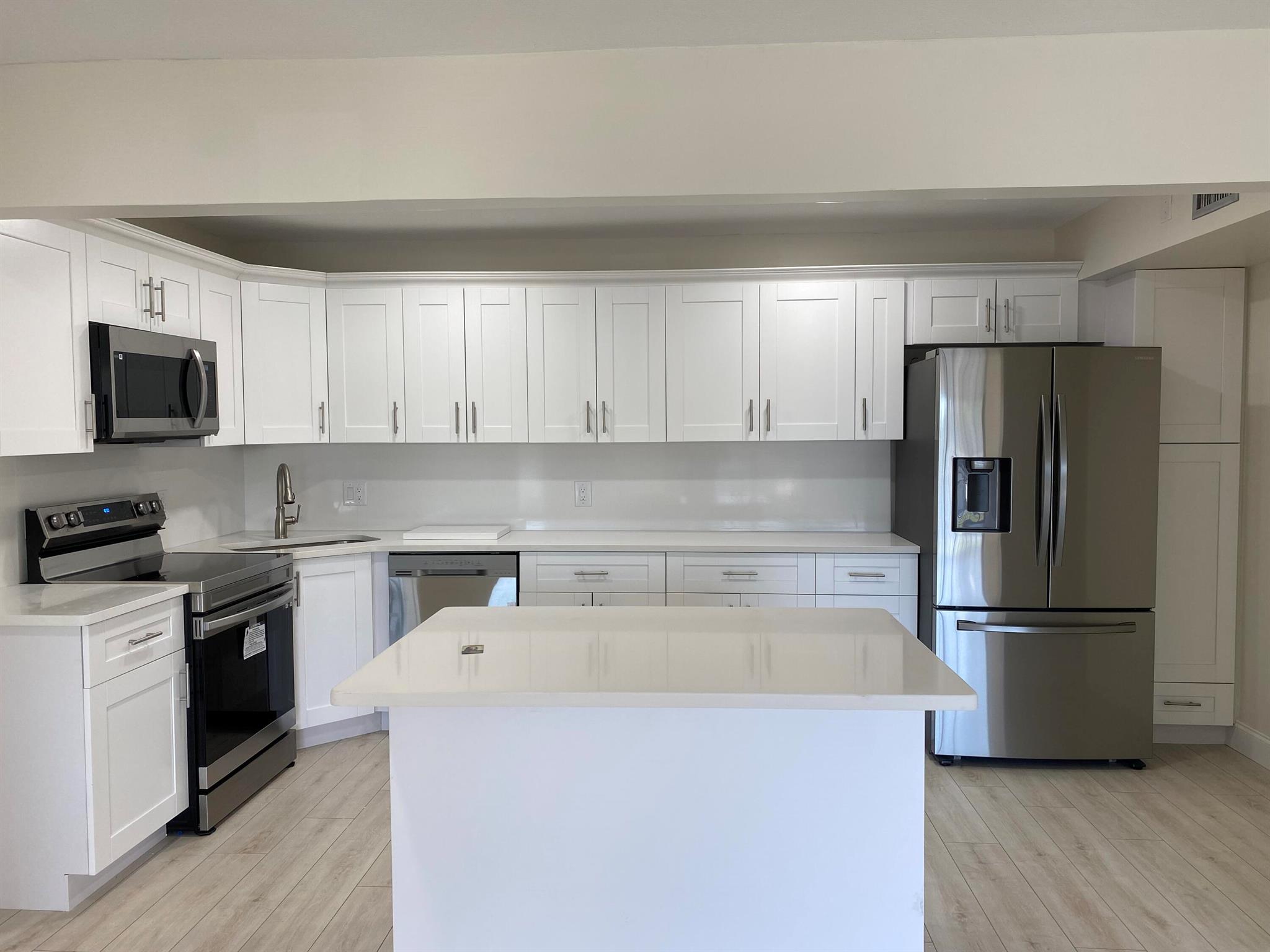 Beautiful modern completely updated yet affordable Condo in Palm City! Waterproof Vinyl floors, top of the line appliances, quartz countertops. Rated A+ Schools!