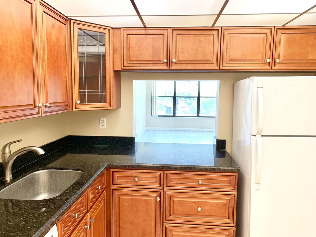 Photo of 2312 S Cypress Bend Drive #209, Pompano Beach, FL 33069 (MLS # B26003144)