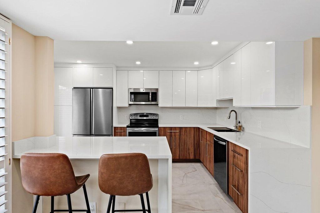 Photo of 3669 Quail Ridge Drive #Bobwhite B, Boynton Beach, FL 33436 (MLS # R10954087)