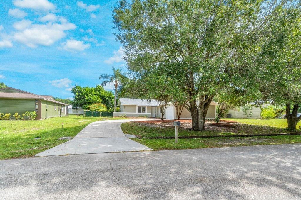 Photo of 207 SW Homeland Road, Port Saint Lucie, FL 34953 (MLS # R10931287)