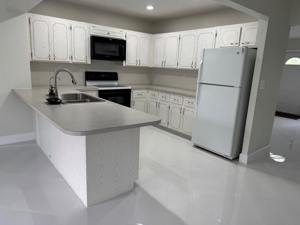 Photo of 364 E Conference Drive, Boca Raton, FL 33486 (MLS # R11085317)