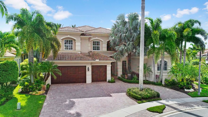 Large private pie shaped lot, located on Cul-de-sac. Perfect place to entertain with covered full outdoor kitchen, heated tropical pool and spa. This home has been impeccably maintained inside and out. This extra large floor plan has fresh paint throughout, custom cabinets and built-ins, marble floors, new carpet in bedrooms. Master bedroom and guest room downstairs, well appointed office with second story loft, gourmet eat-in kitchen. Three additional bedrooms upstairs with bonus game room. This home presently has a social club membership so buyers have a choice of either golf or social membership.  Club offers golf, tennis, country club and casual dining, spa, pool and great children activities. Shows very well and is a must see!