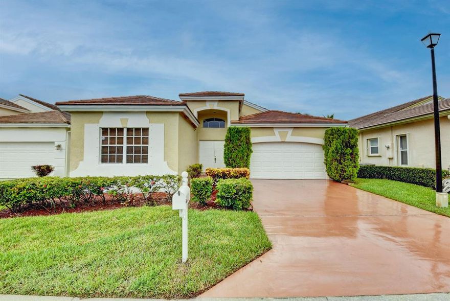 AWESOME SINGLE STORY IN BEAUTIFUL, GATED COMMUNITY, NO CLUB MEMBERSHIP IS REQUIRED.  4 BEDROOMS, 2 BATHROOMS, 2 CAR GARAGE.  WONDERFUL UPGRADES INCLUDE LARGE PORCELAIN TILE FLOORING, REMODELED BATHROOMS AND KITCHEN (CUSTOM CABINETS, STAINLESS APPLIANCES, GRANITE. WONDERFUL NEIGHBORHOOD LOCATION. THERE ARE BAMBOO WOOD FLOORS IN THE BEDROOMS AND A LARGE COVERED PATIO OUT BACK.  
MINUTES TO SHOPPING, DINING AND ALL THAT PALM BEACH HAS TO OFFER.