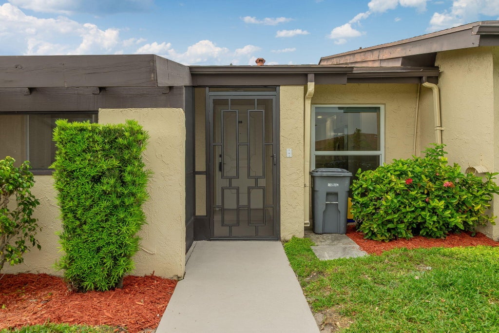 Photo of 13665 VIA AURORA #C, Delray Beach, FL 33484 (MLS # B26087057)