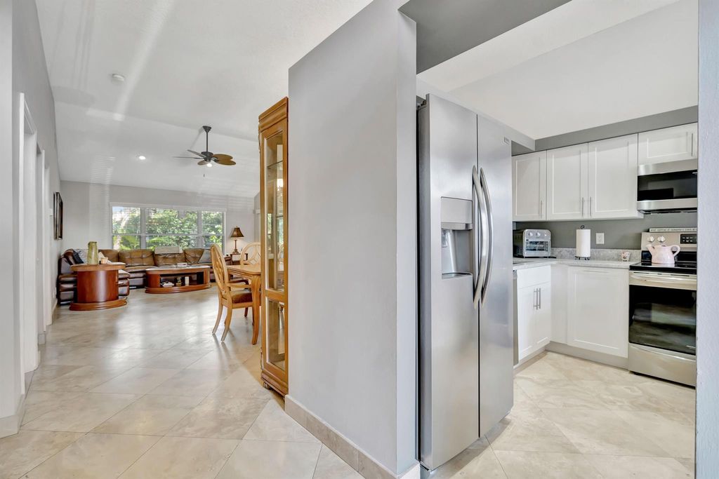 Photo of 7036 Galleon Cove, Riviera Beach, FL 33418 (MLS # R11145699)