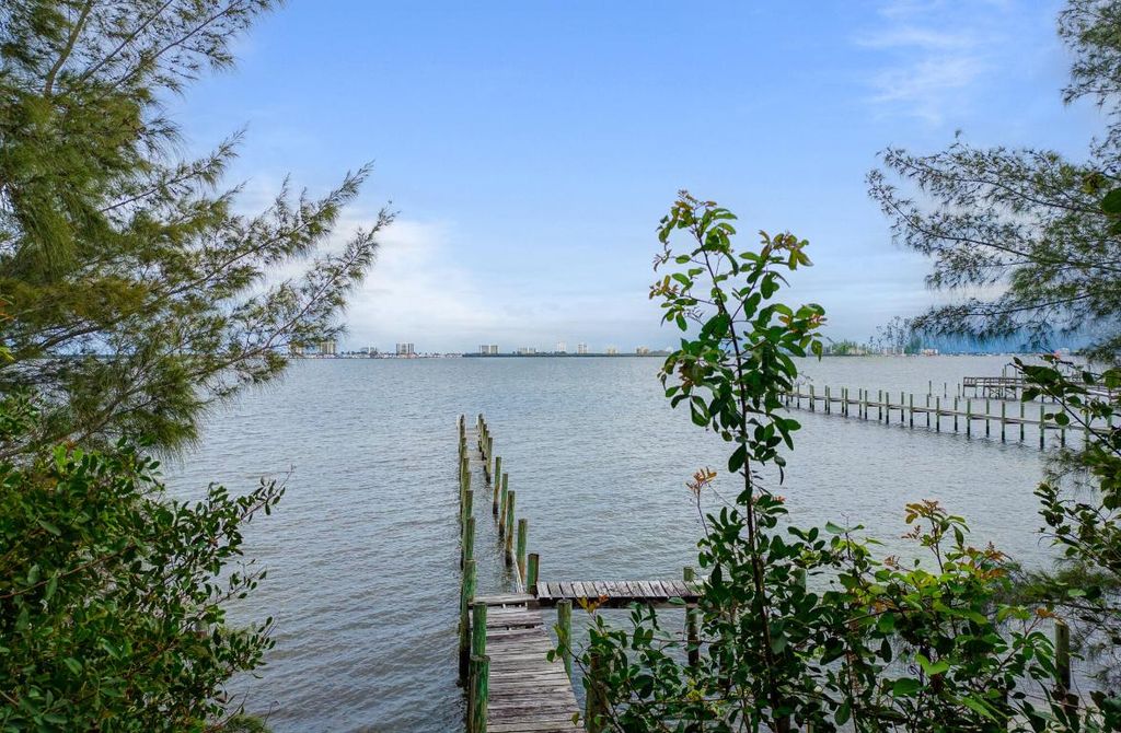 Photo of 13179 S Indian River Drive, Jensen Beach, FL 34957 (MLS # R11118799)