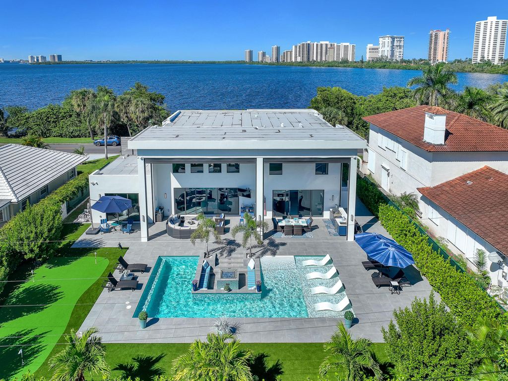 Photo of 1161 Pine Point Road, Riviera Beach, FL 33404 (MLS # R11151327)