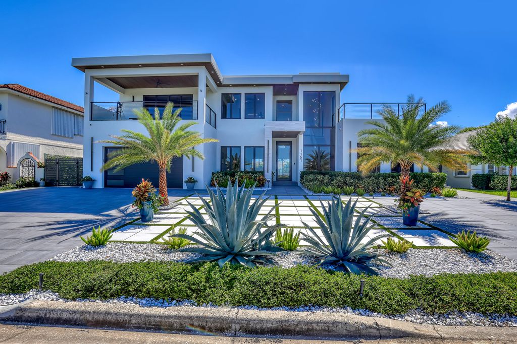 Photo of 1161 Pine Point Road, Riviera Beach, FL 33404 (MLS # R11151327)