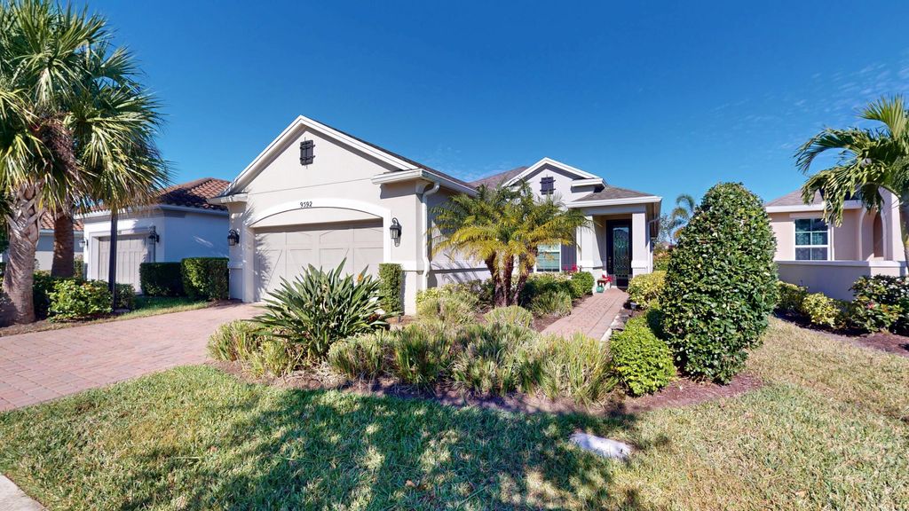 Photo of 9592 SW Royal Poinciana Drive, Port Saint Lucie, FL 34987 (MLS # B26009145)