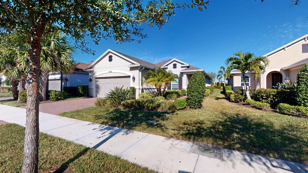 Photo of 9592 SW Royal Poinciana Drive, Port Saint Lucie, FL 34987 (MLS # B26009145)