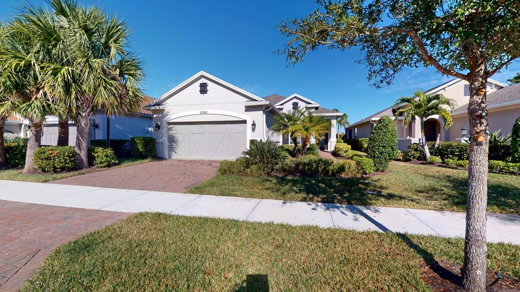 Photo of 9592 SW Royal Poinciana Drive, Port Saint Lucie, FL 34987 (MLS # B26009145)