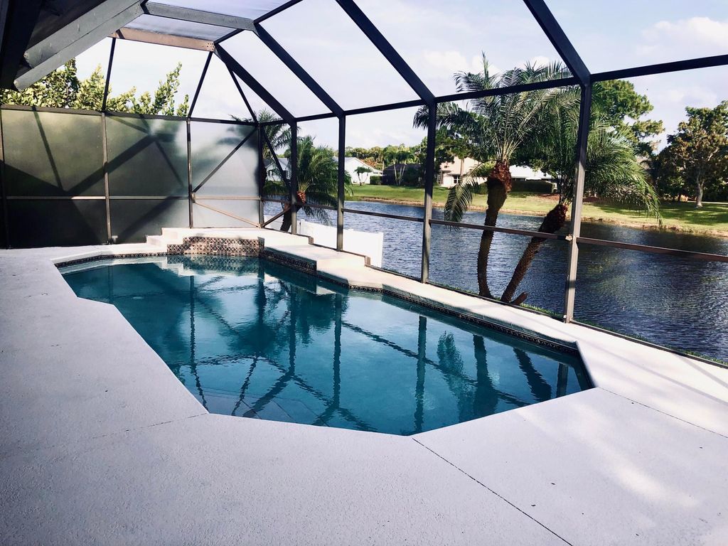 Photo of 2054 SW Hunters Club Way, Palm City, FL 34990 (MLS # R10992383)