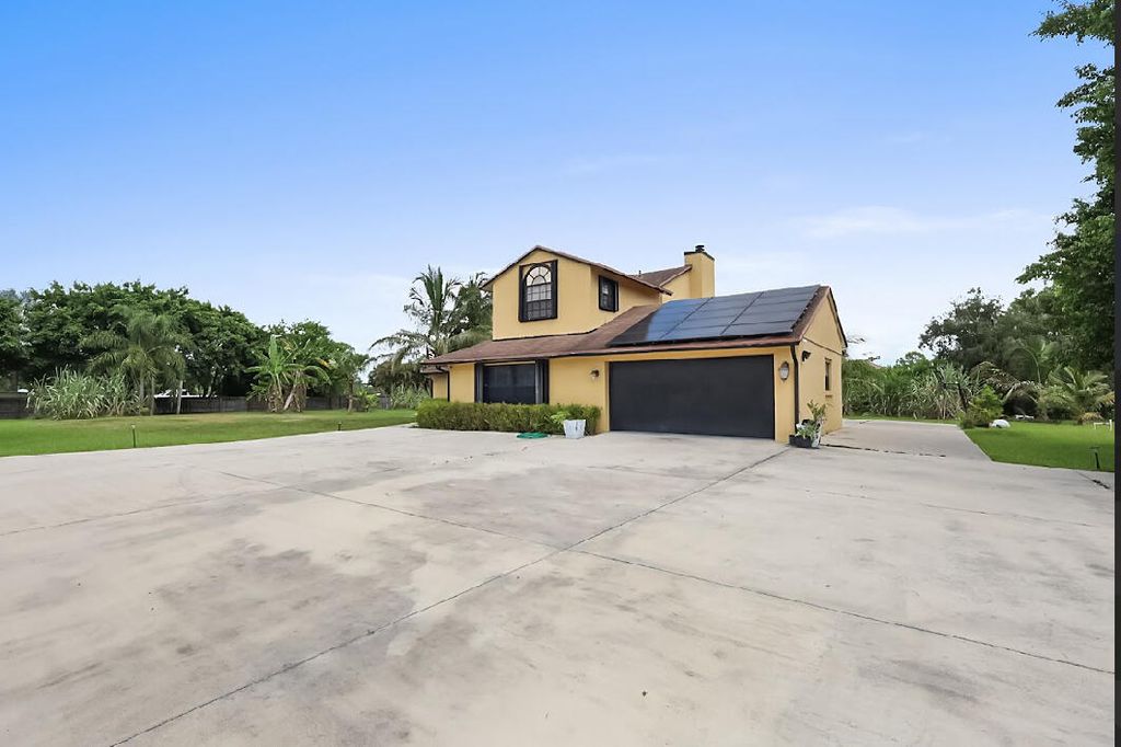 Photo of 12480 Orange Boulevard, The Acreage, FL 33412 (MLS # R11117536)