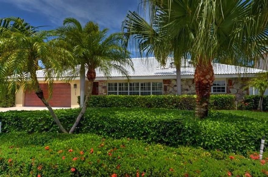 Priced to sell this unbelievable home in Lighthouse Point with everything you've ever dreamed of:no fixed bridges, Lake placid location,amazing water views, deep water with dock and seawall in excellent condition, brand new bathrooms w quartz vanities,huge great room with vaulted ceilings,wood burning fireplace, plenty of yard space for the dog/swing set,newer kitchen with exotic stone countertops,stainless appliances and built in new wine cooler.Lowest Priced LHP waterfront south of Sample by $300,000.