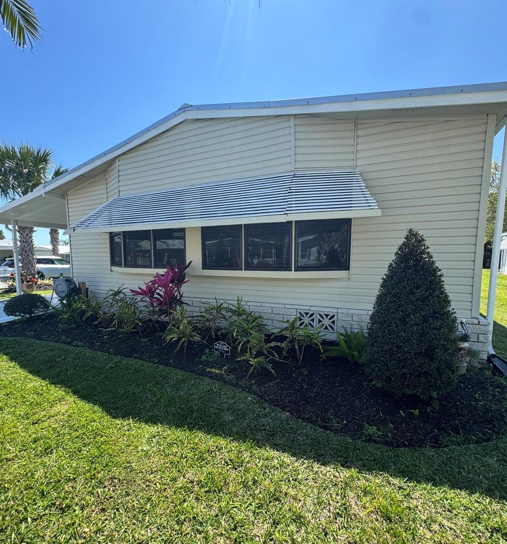 Photo of 14299 Dalia Avenue, Fort Pierce, FL 34951 (MLS # R11070998)