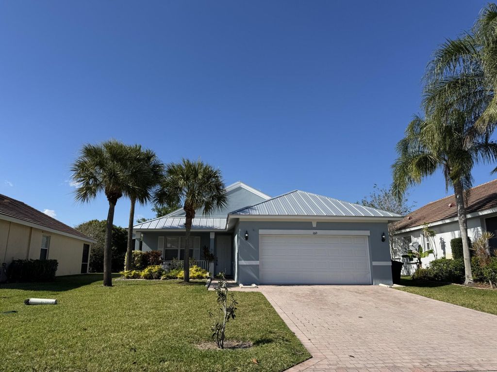 Photo of 160 NW Willow Grove Avenue, Port Saint Lucie, FL 34986 (MLS # R11076514)