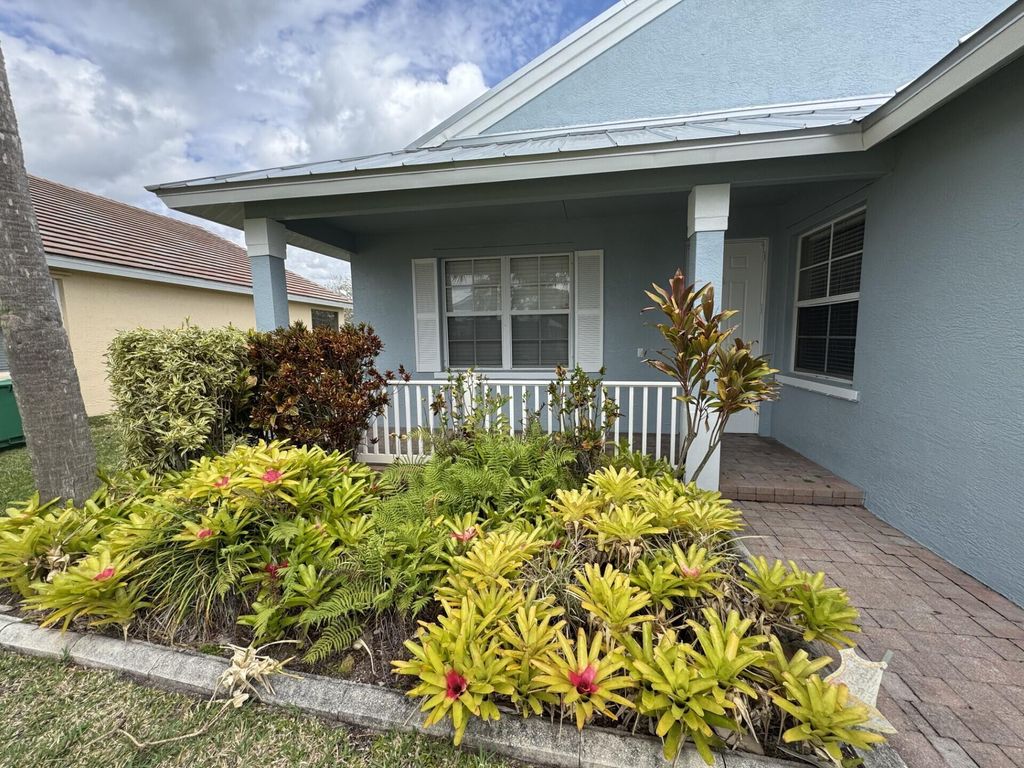 Photo of 160 NW Willow Grove Avenue, Port Saint Lucie, FL 34986 (MLS # R11076514)