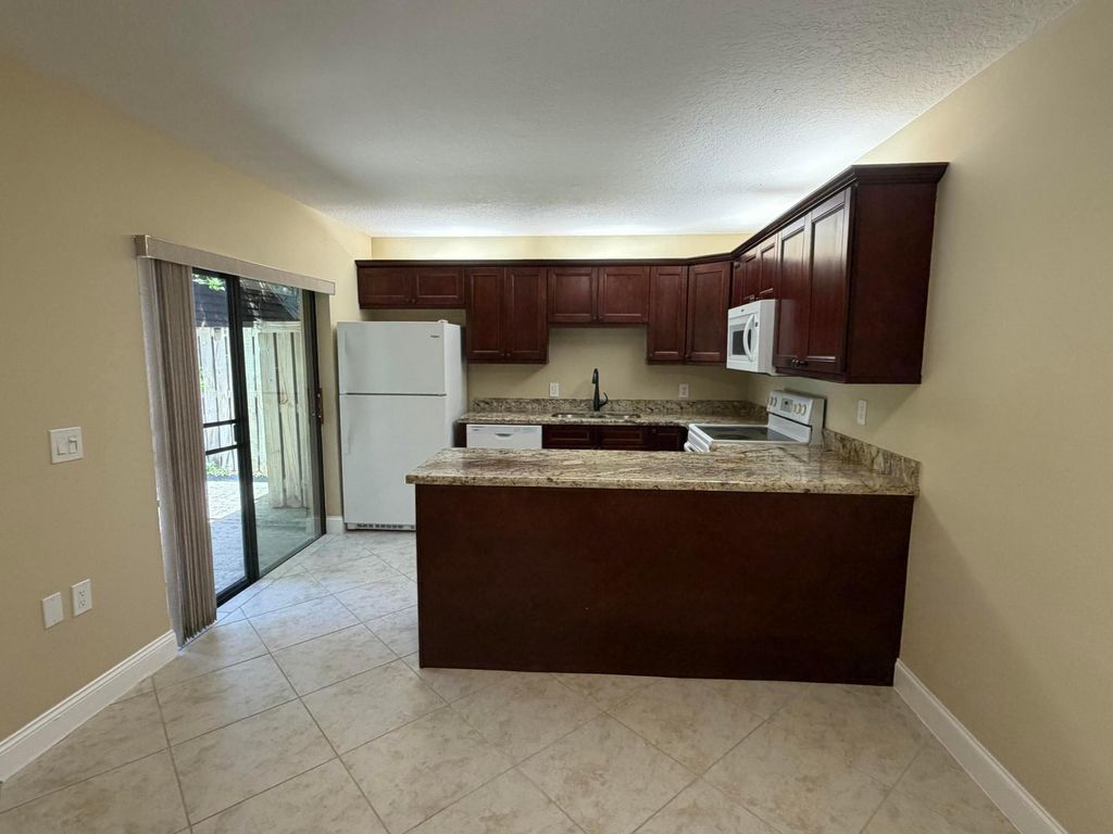 Photo of 2407 24th Lane, Palm Beach Gardens, FL 33418 (MLS # B26026031)